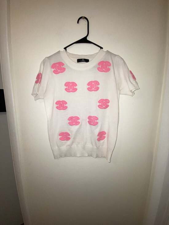 Chanel Tops - Chanel off-White Short-Sleeve Knit Top with Pink CC Logos